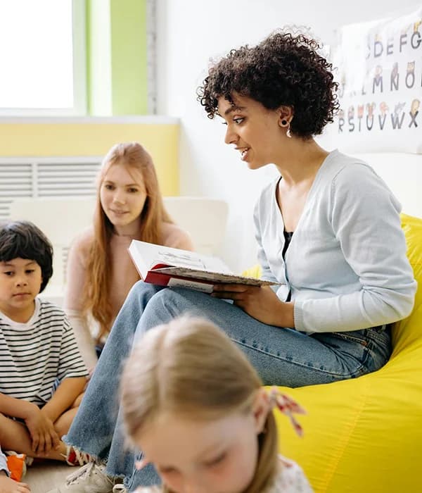 Teacher reading with children