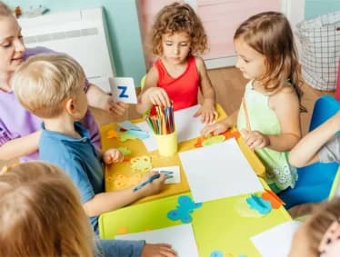 Children learning together in class