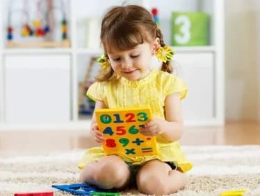Children enjoying reading and creative time