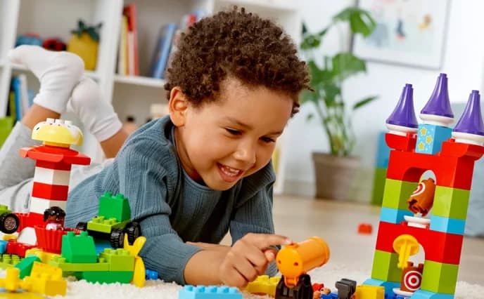 Children building with colorful blocks